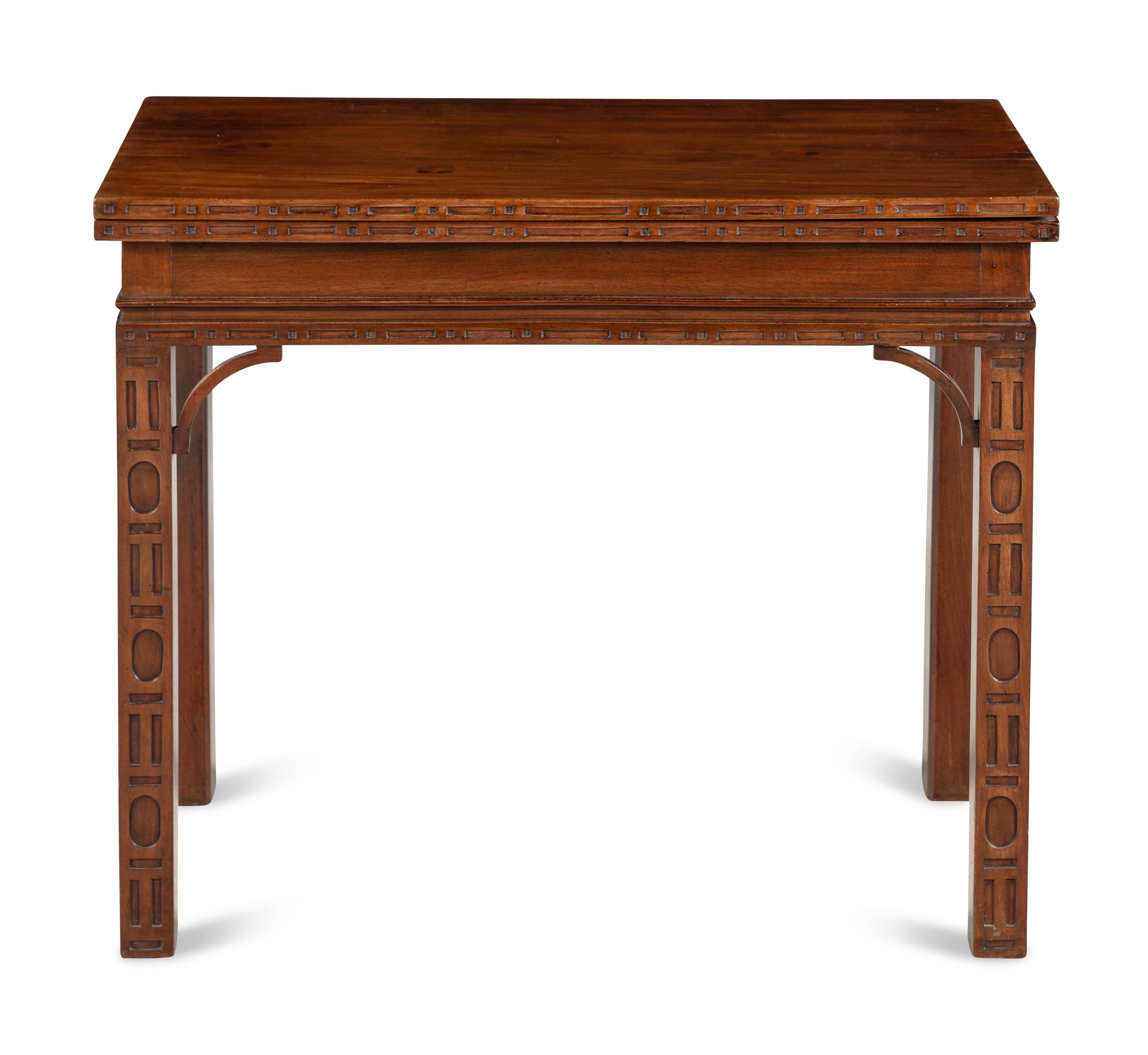 A George III Mahogany Blind Fret Carved Flip-Top Table