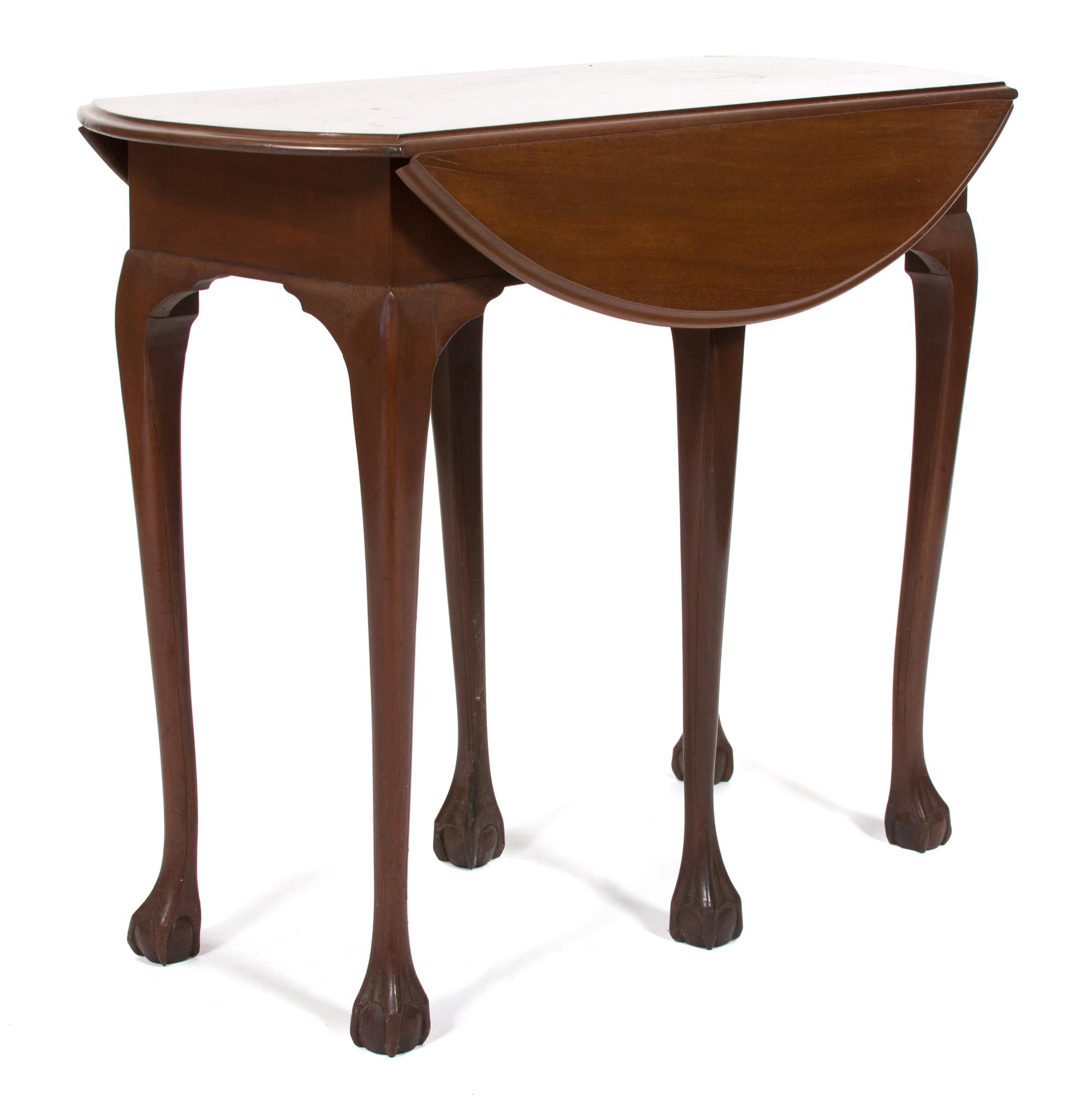A Chippendale Style Mahogany Oval Drop Leaf Table Height 27 1/2 x width 35 1/4 x depth 26 1/2 inches. — 20TH CENTURY