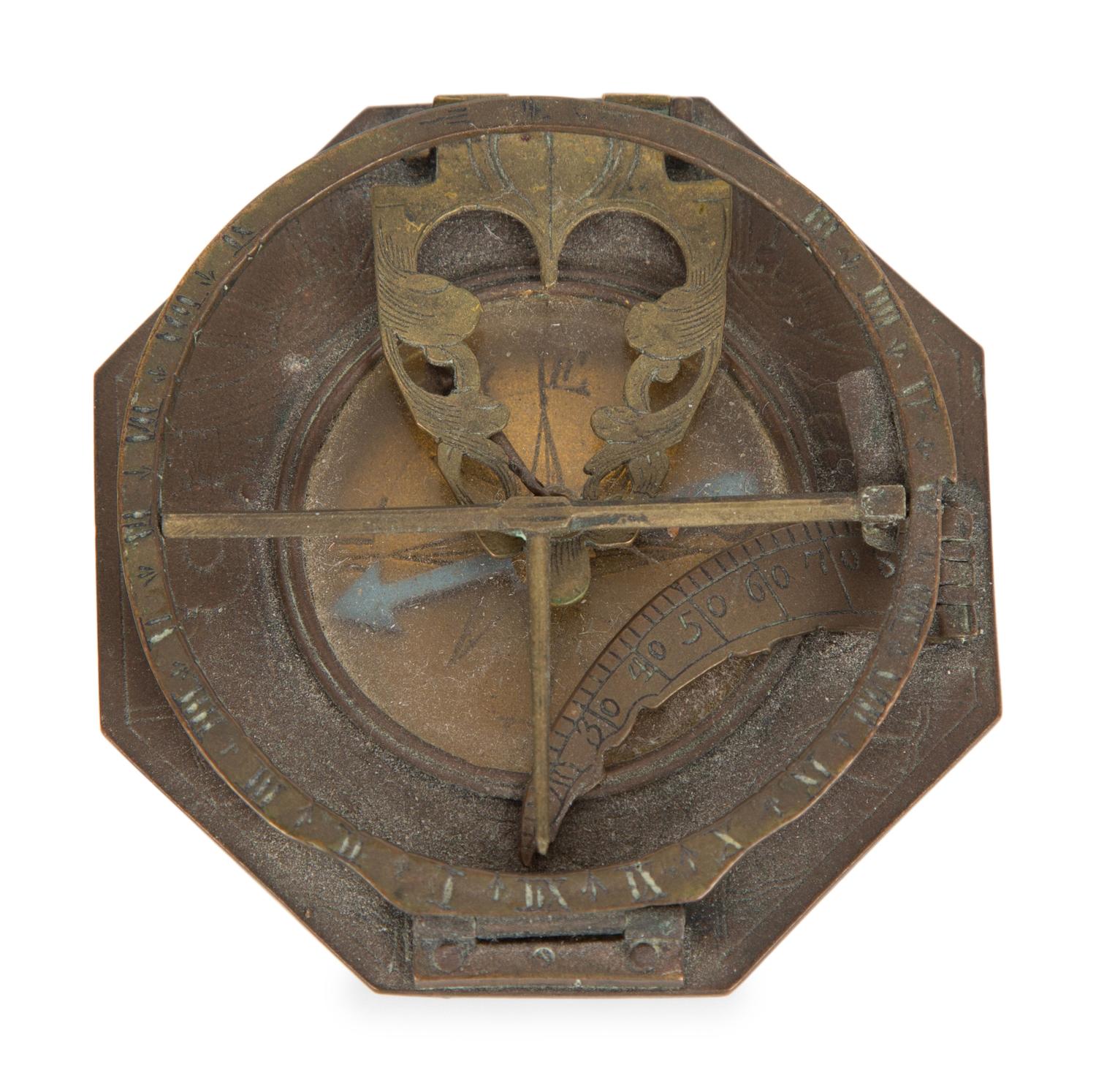 An English Brass Lantern Clock and A Sundial/Compass