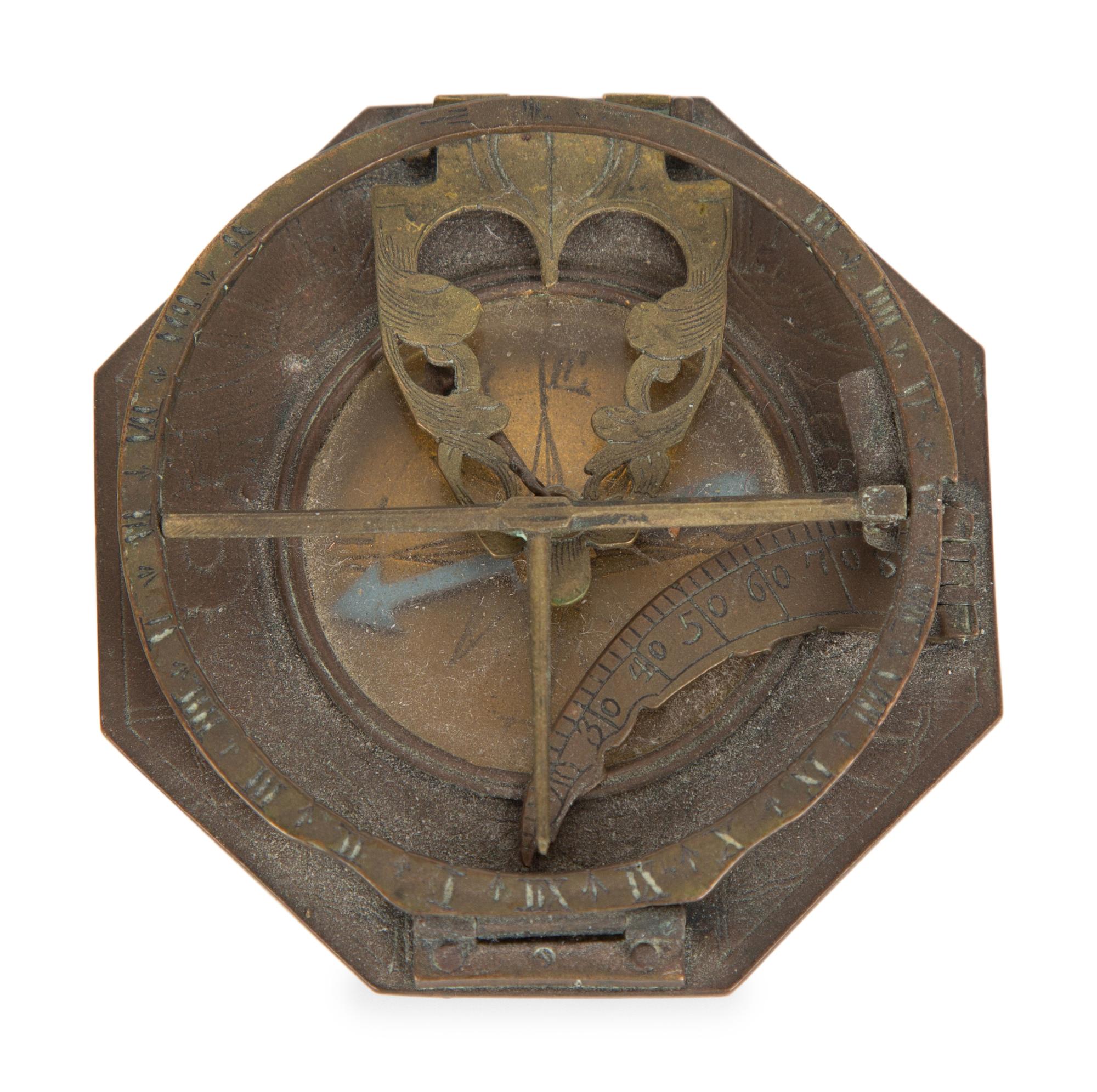 An English Brass Lantern Clock and A Sundial/Compass