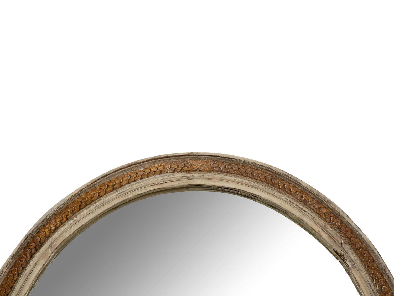 A Gustavian Style Painted and Parcel Gilt Oval Mirror
