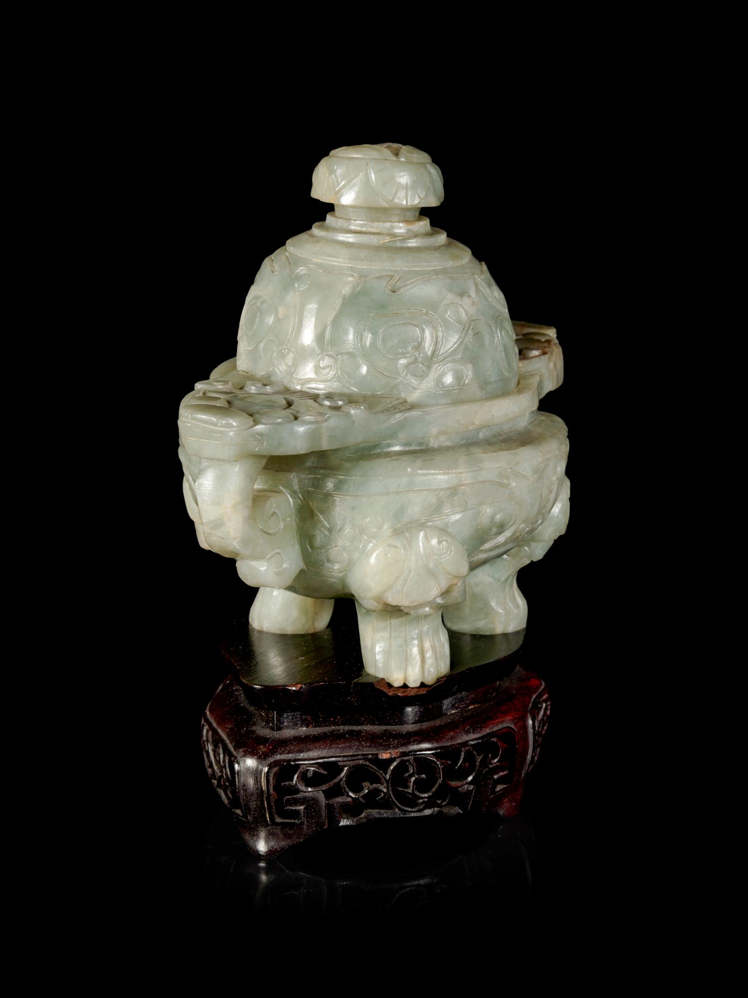 A Chinese Hardstone Tripod Censer and Cover