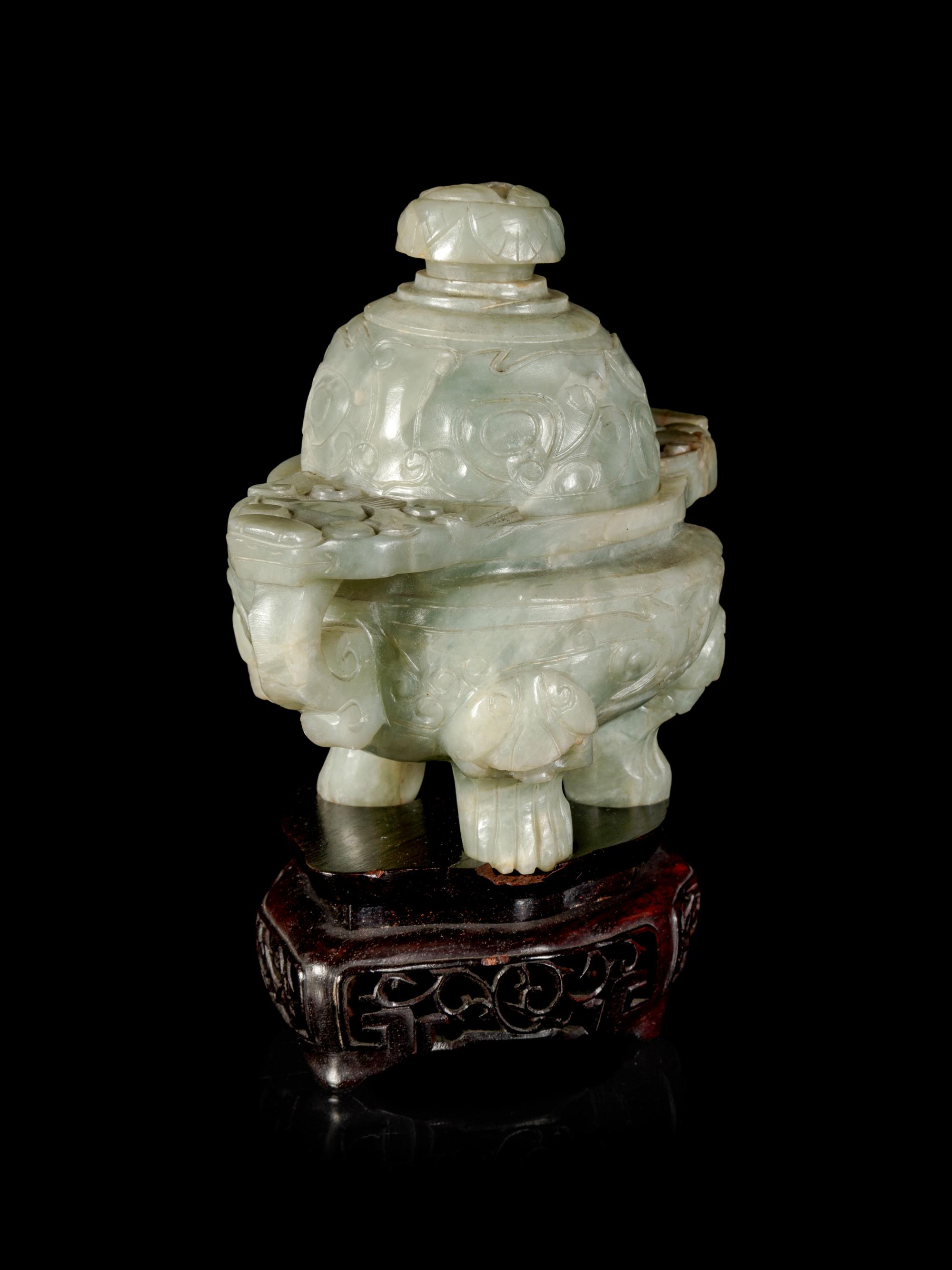 A Chinese Hardstone Tripod Censer and Cover