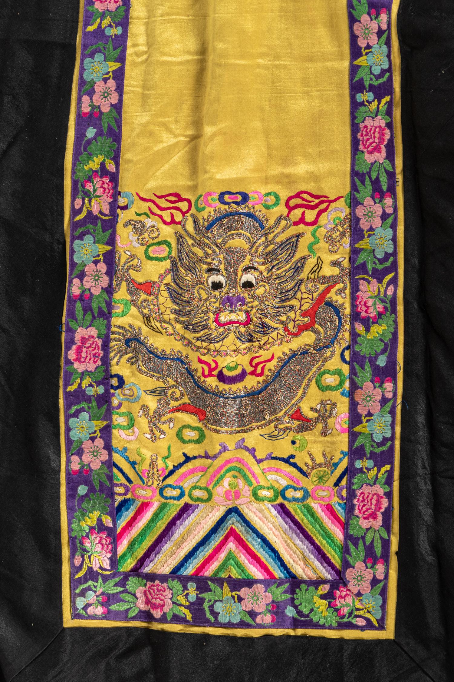 A Chinese Lady's Embroidered Silk Jacket and A Yellow Ground Silk Apron Skirt