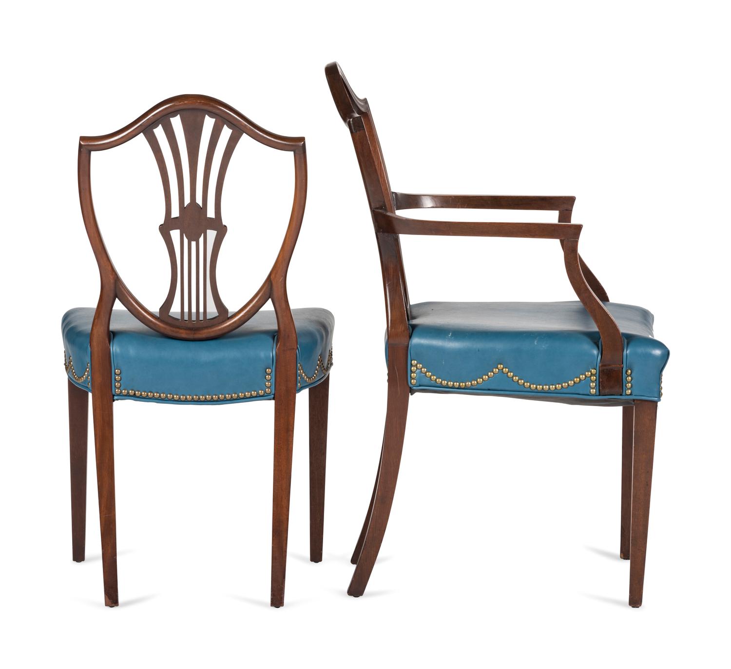 A Set of Eight Federal Style Inlaid and Volute-Carved Mahogany Shield-Back Dining Chairs