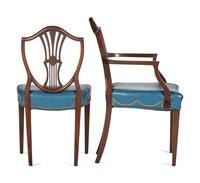 A Set of Eight Federal Style Inlaid and Volute-Carved Mahogany Shield-Back Dining Chairs