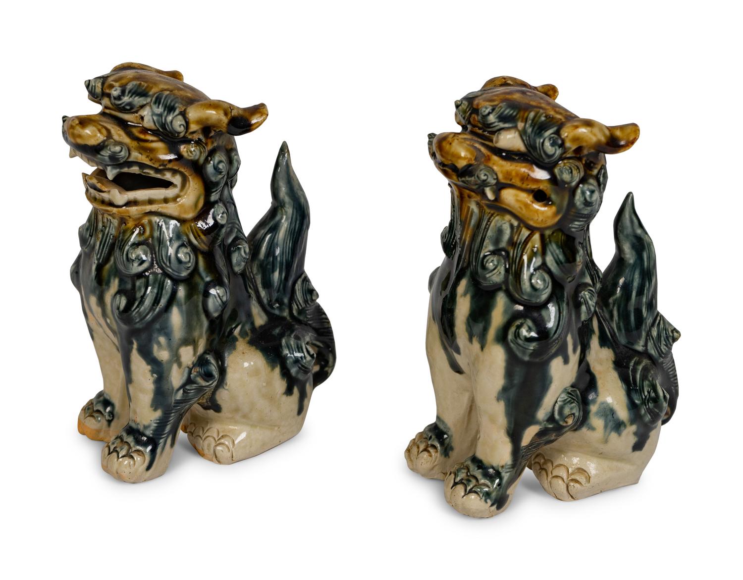A Pair of Ceramic Models of Buddhistic Lions