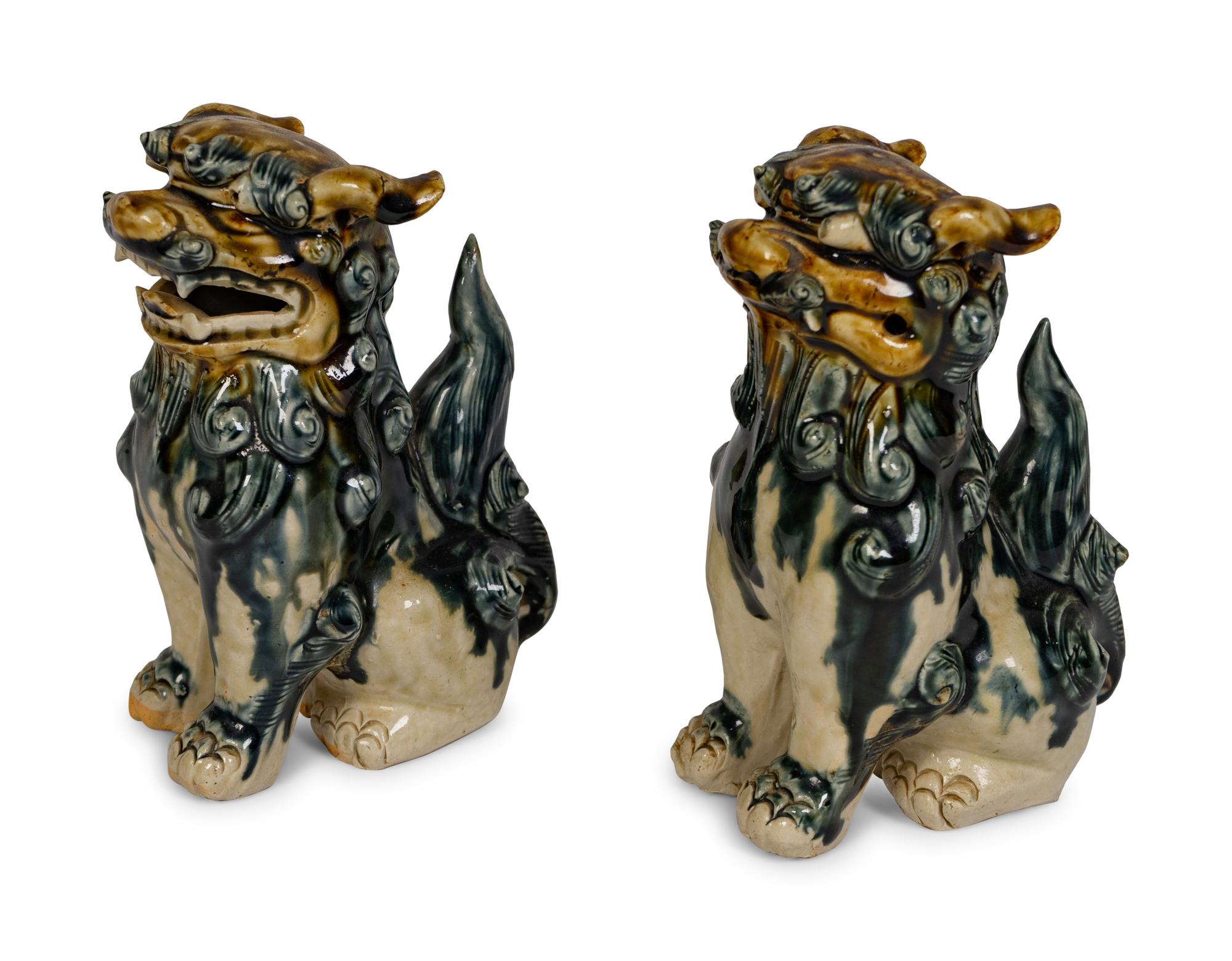 A Pair of Ceramic Models of Buddhistic Lions