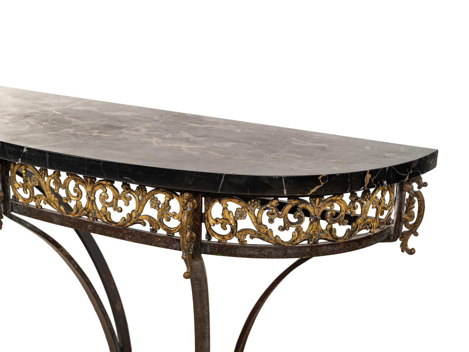 A Continental Ebonized and Parcel Gilt Metal Marble-Top Console Table and Mirror