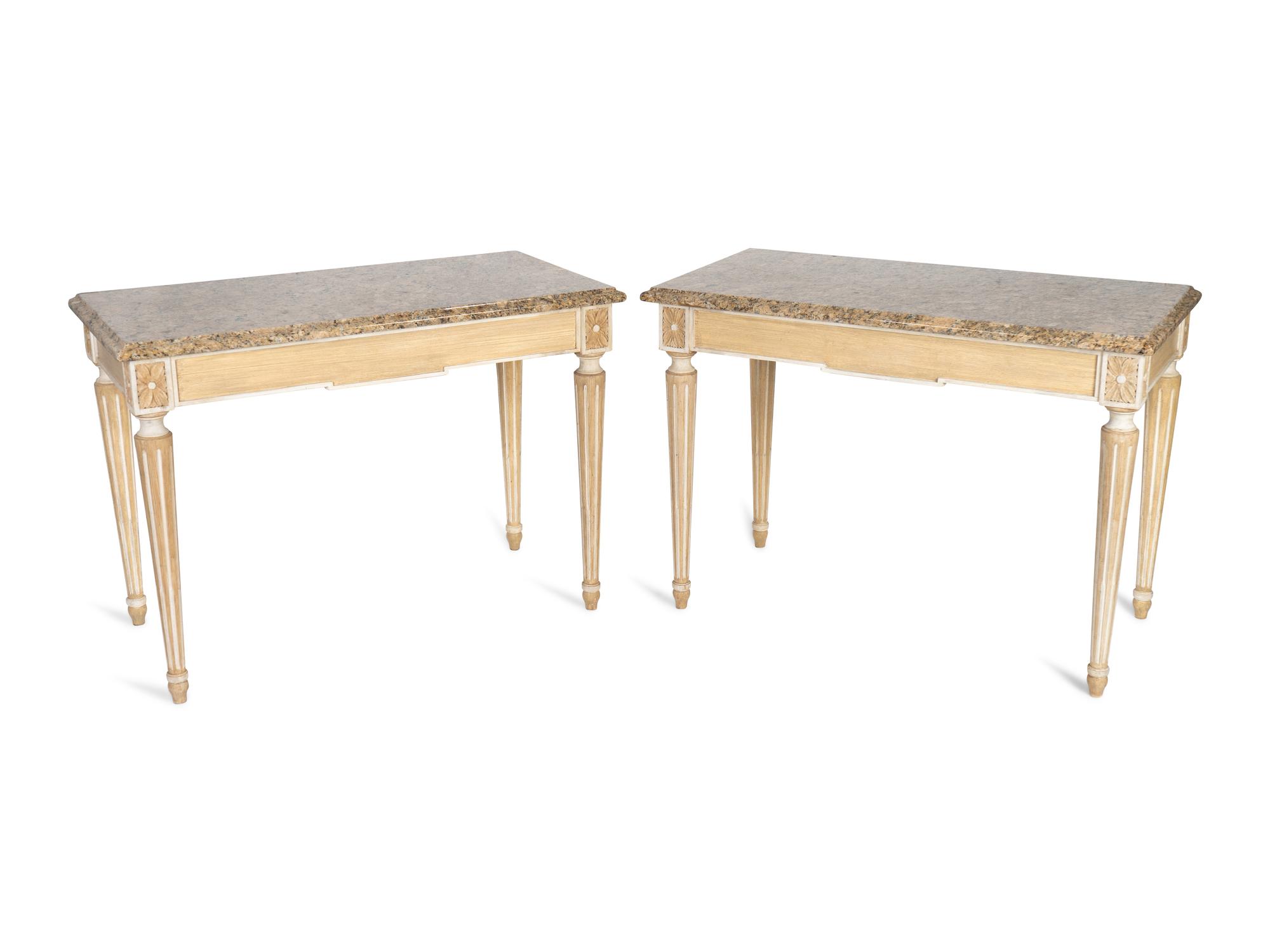 A Pair of Neoclassical Carved and Painted Console Tables with Granite Tops — 20TH CENTURY