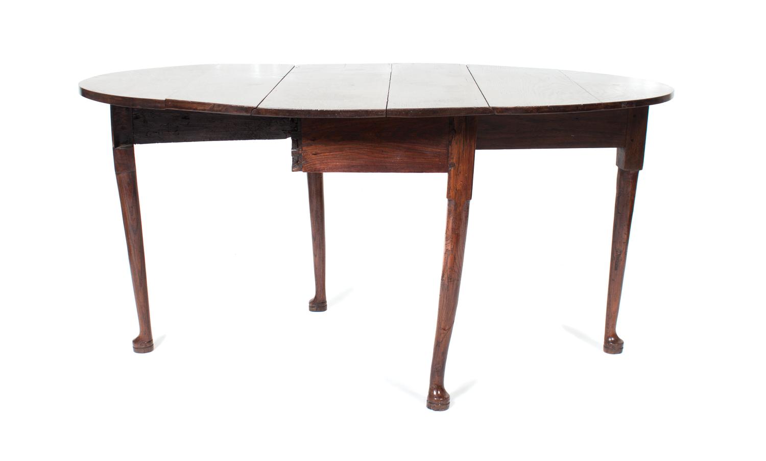 A Drop-Leaf Table Height 28 1/2 x width 59 1/4 x depth 39 3/4 inches.