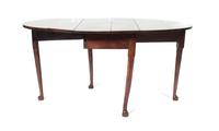 A Drop-Leaf Table Height 28 1/2 x width 59 1/4 x depth 39 3/4 inches.