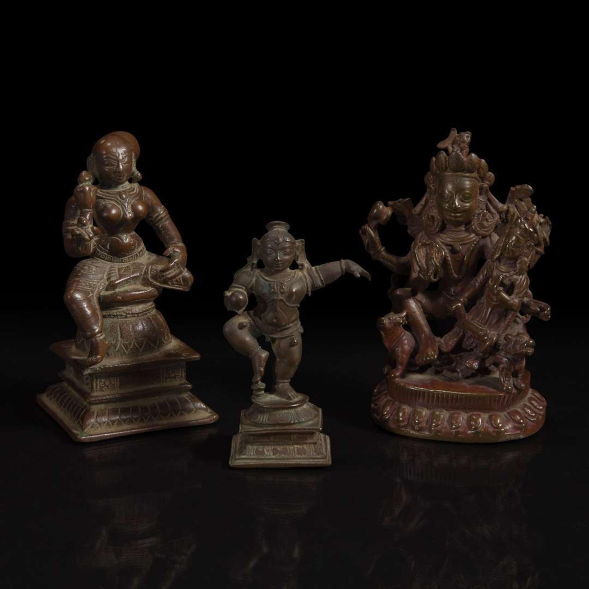 A group of seven assorted Indian and Himalayan bronzes 印度及喜马拉雅铜佛造像一组七件 17th/18th century and later ??????????