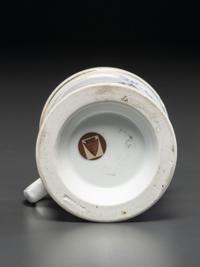 A Porcelain Shaving Mug Depicting a Steam-Powered Tractor