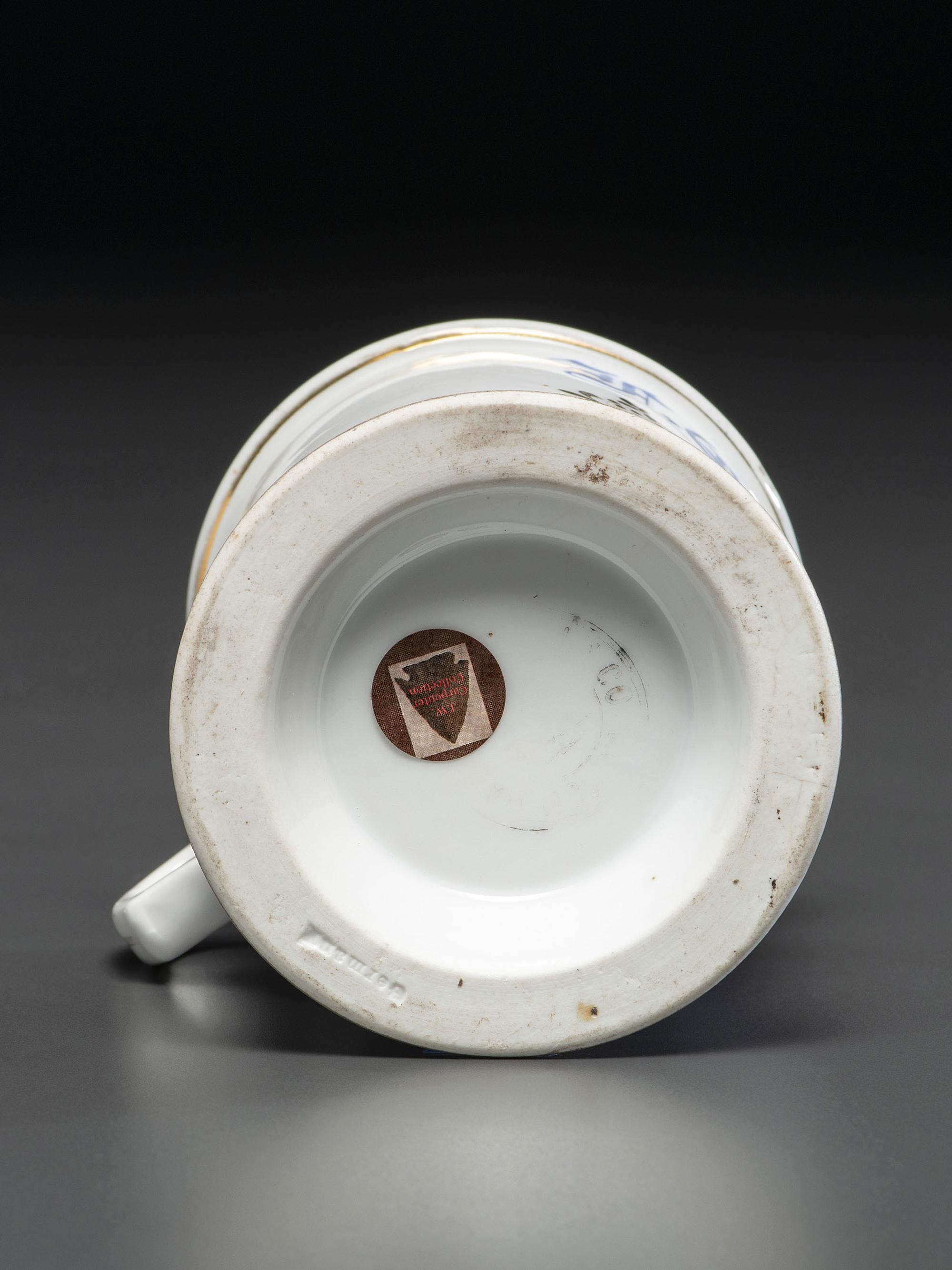 A Porcelain Shaving Mug Depicting a Steam-Powered Tractor