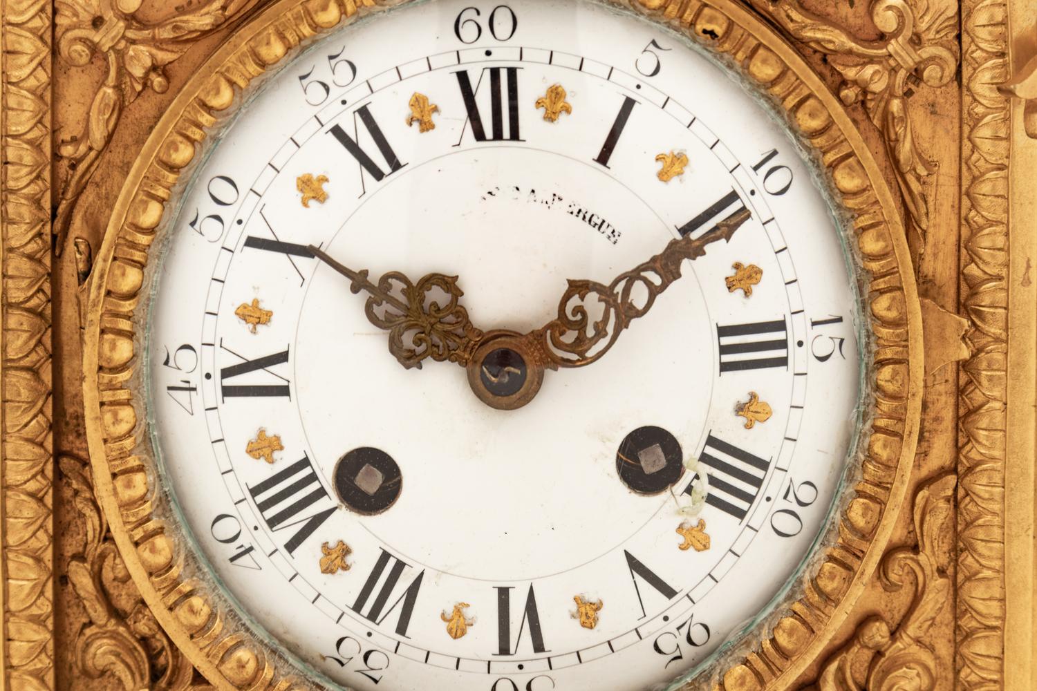 A Louis XVI Style Gilt Bronze Mantel Clock