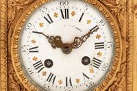 A Louis XVI Style Gilt Bronze Mantel Clock
