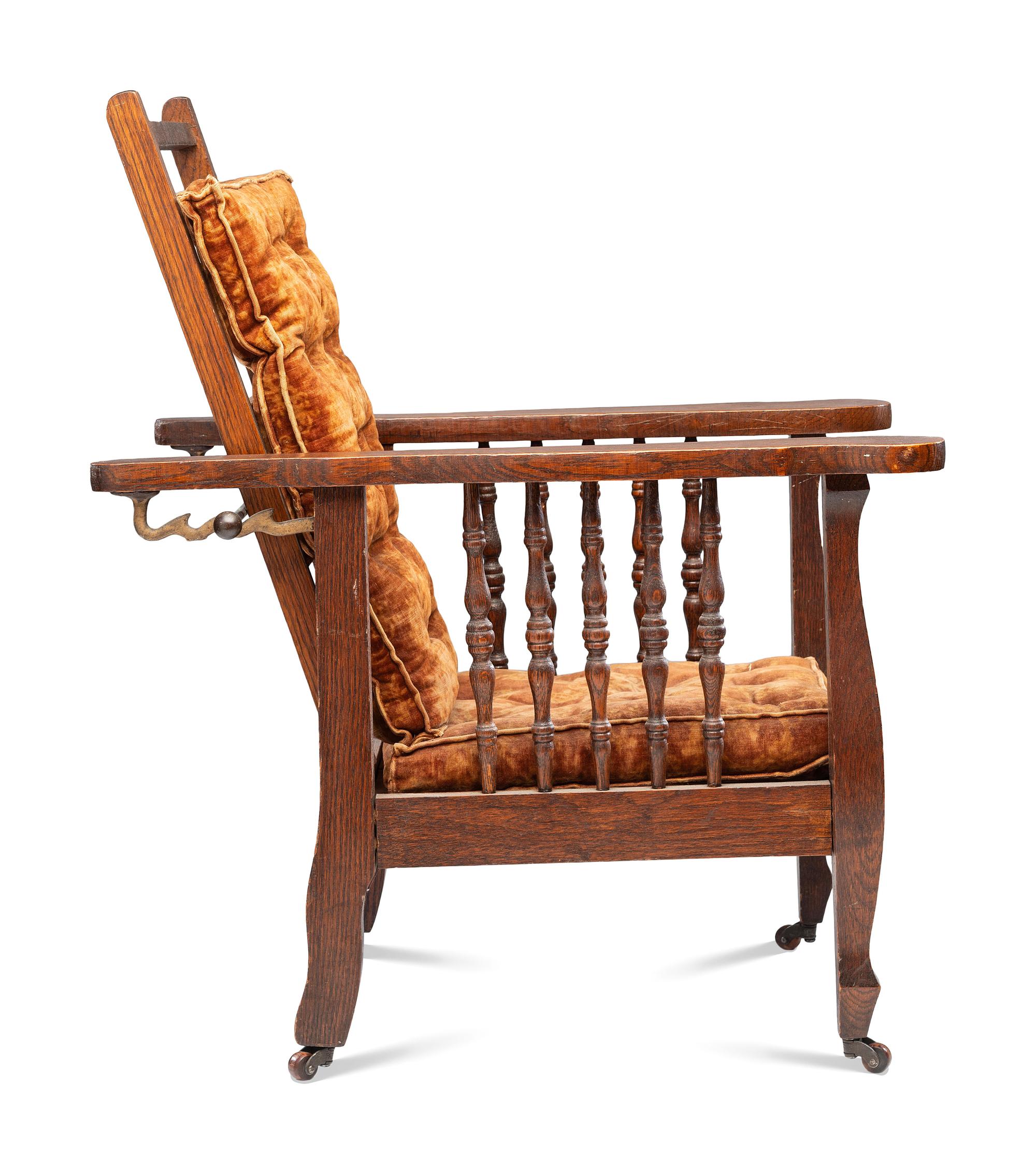 A Victorian Carved Mahogany and Tufted Velvet Upholstered Child's Reclining Armchair