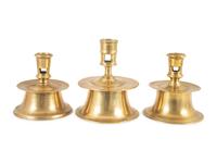 Three Continental Brass Capstan Candlesticks