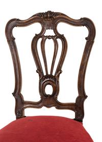 A Set of Five Louis XV Style Carved Walnut Dining Chairs