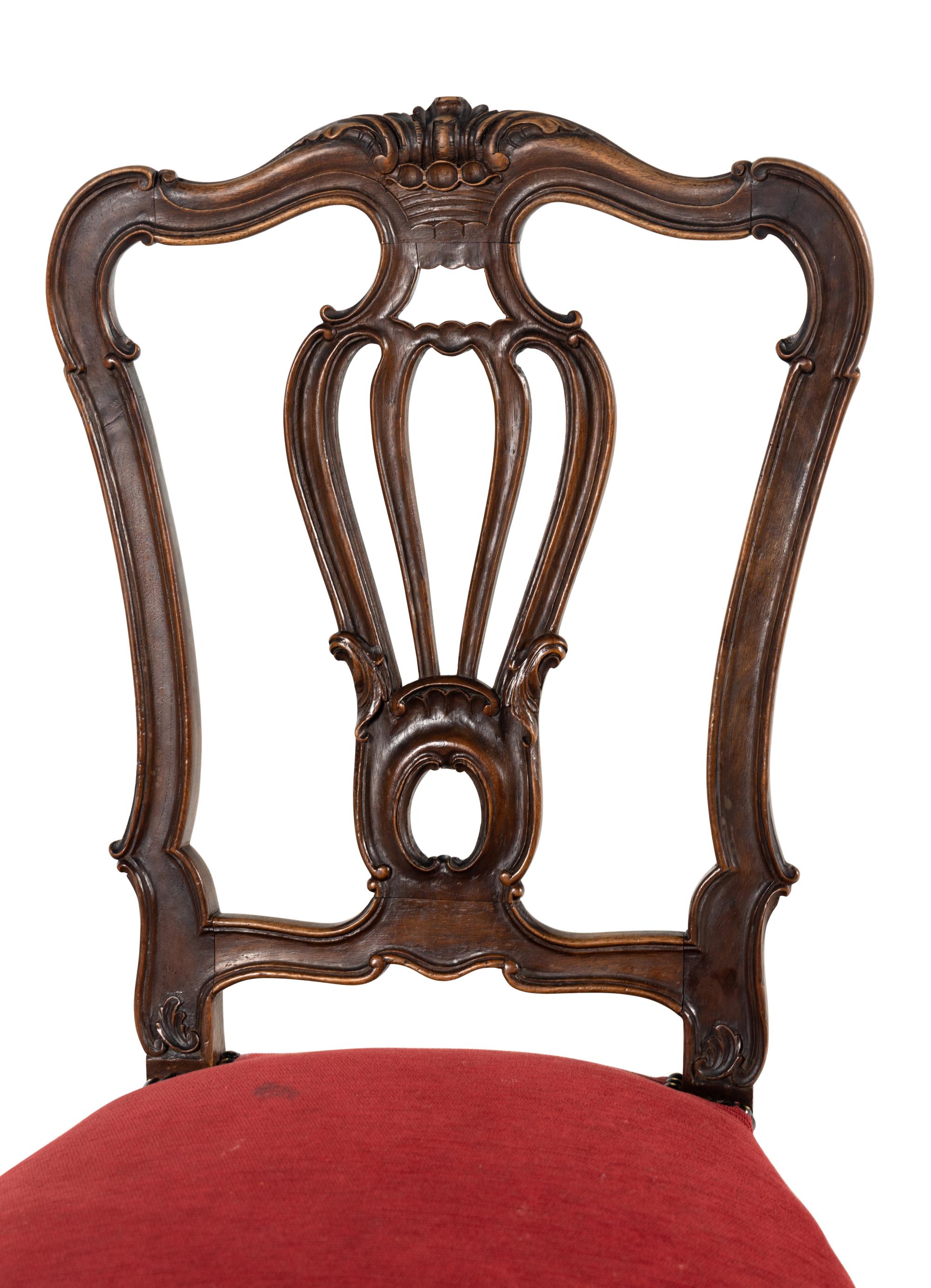 A Set of Five Louis XV Style Carved Walnut Dining Chairs