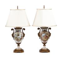 A Pair of Gilt Bronze Mounted Sèvres Style Porcelain Urns Mounted as Lamps