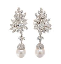 A Pair of Platinum and Diamond Spray Earclips, Van Cleef & Arpels, with Detachable Cultured Pearl and Diamond Drops, 23.40 dwts.