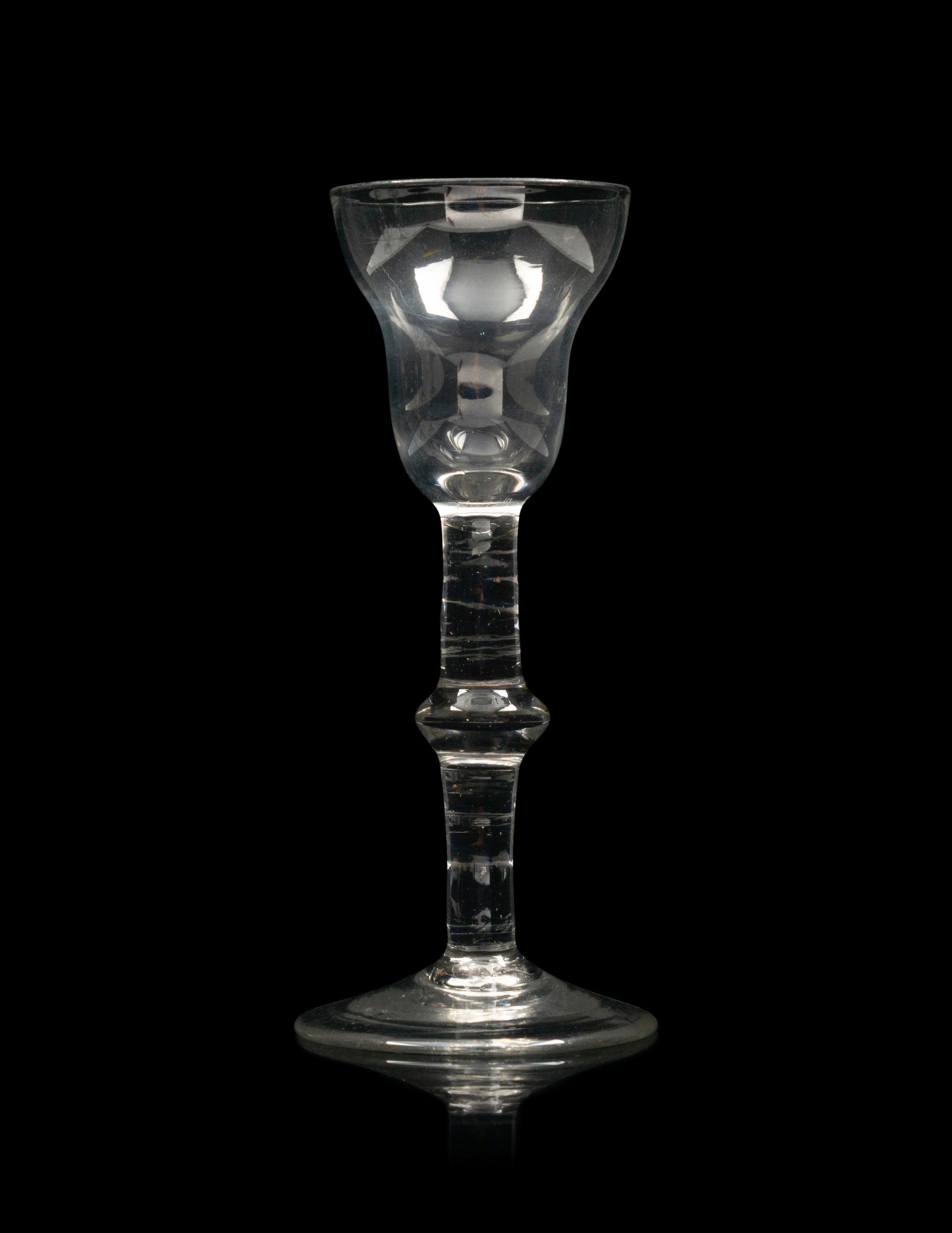 A Group of Three English Knopped Stem Wine Glasses