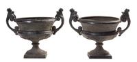 A Set of Five Victorian Painted Iron Jardinieres Width 28 1/2 inches.