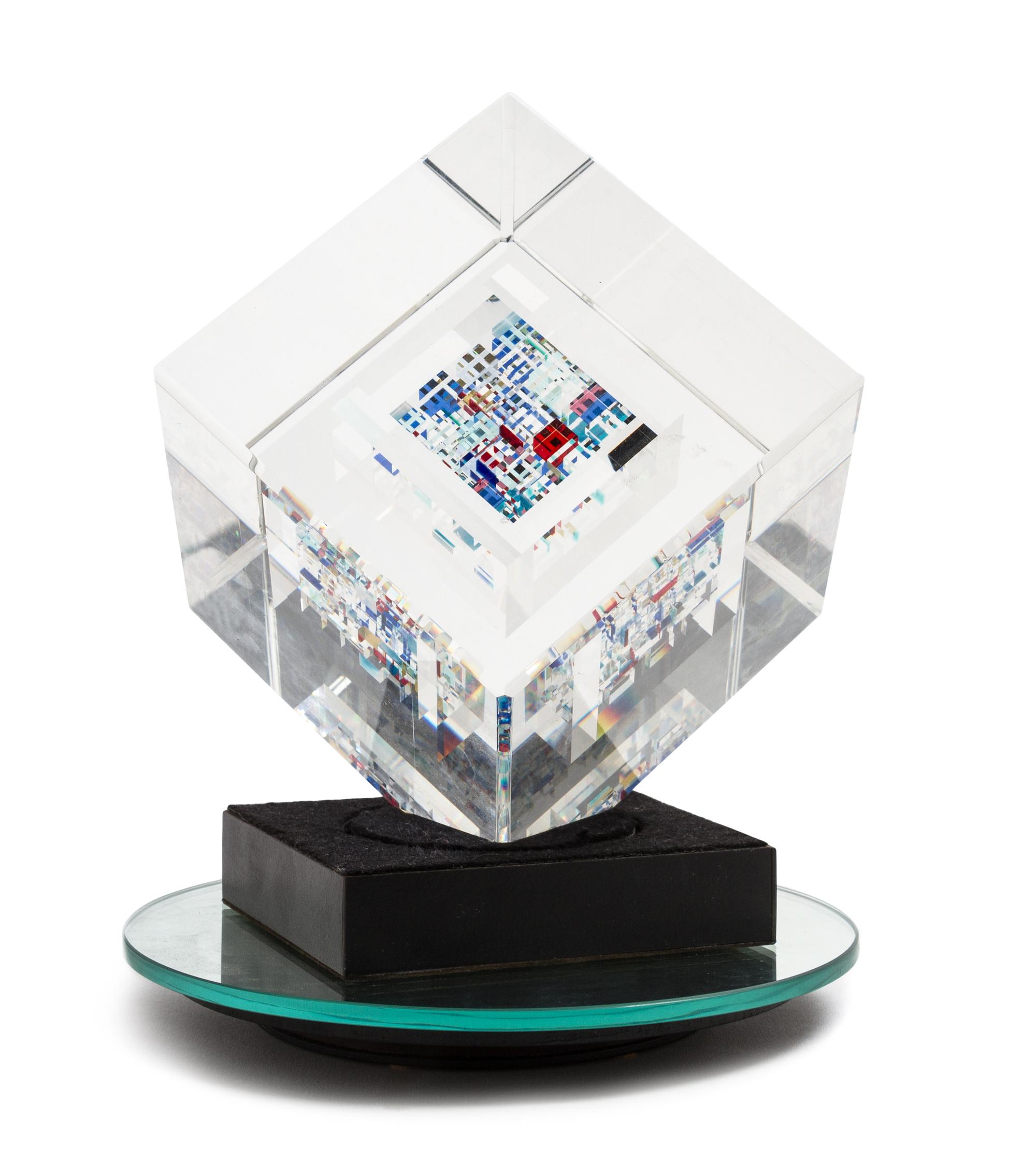 An American Studio Glass Sculpture, John Kuhn (b. 1949) Height overall 9 inches, height of cube 5 1/4 inches.