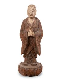 A Chinese Carved and Polychrome Decorated Wood Figure in Prayer