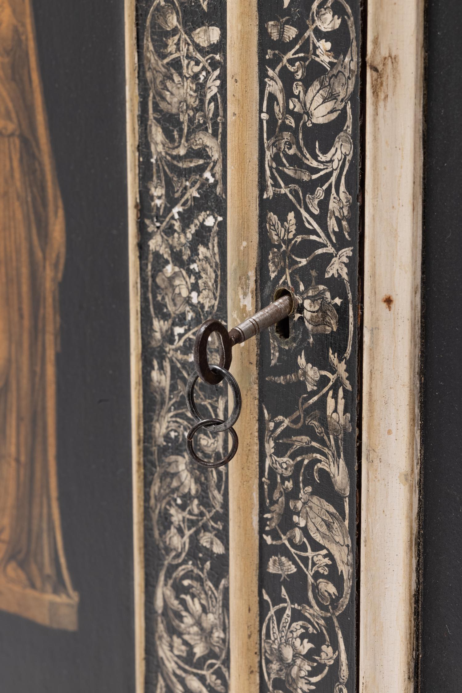 A Continental Painted Hanging Cupboard Decorated with Classical Figures