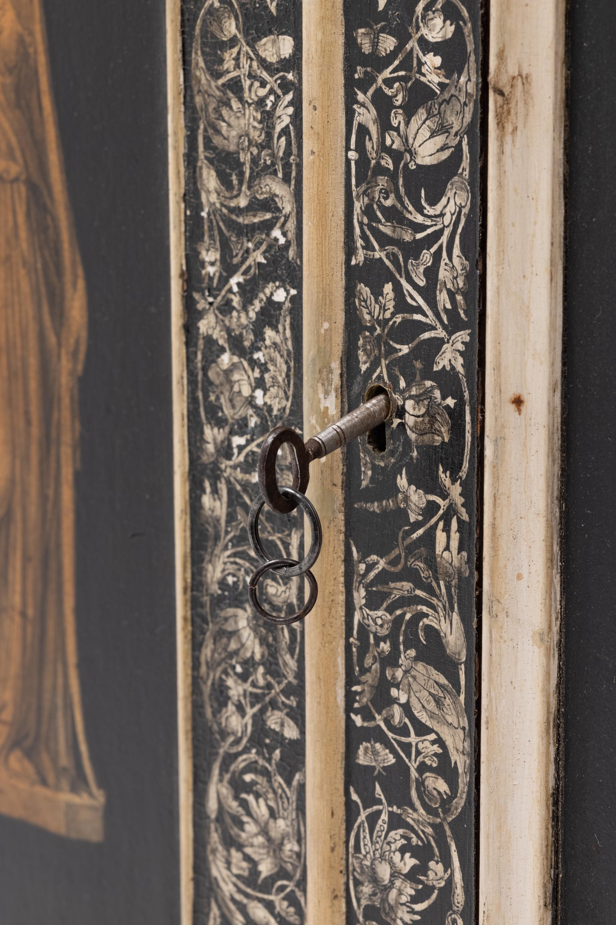 A Continental Painted Hanging Cupboard Decorated with Classical Figures