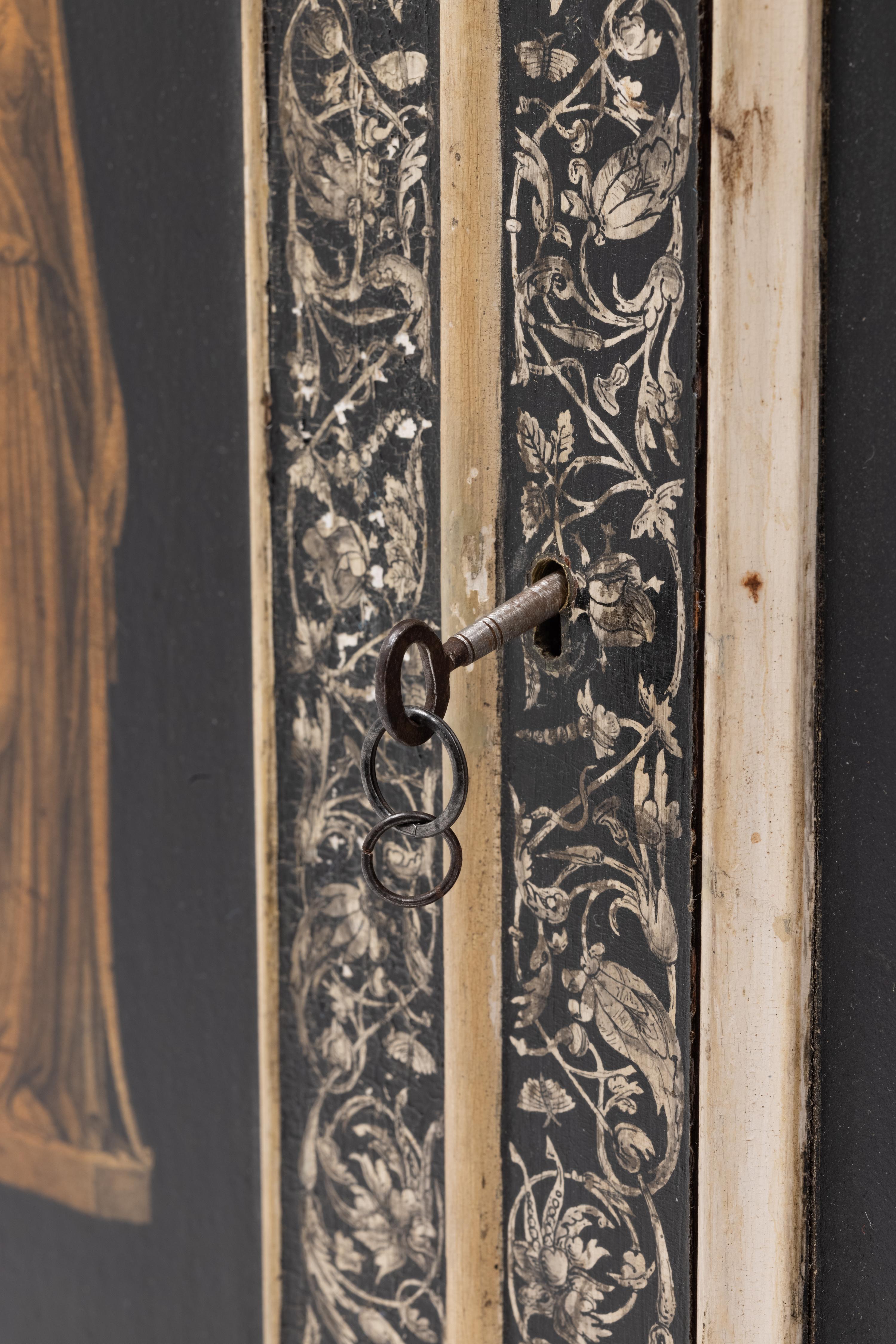 A Continental Painted Hanging Cupboard Decorated with Classical Figures
