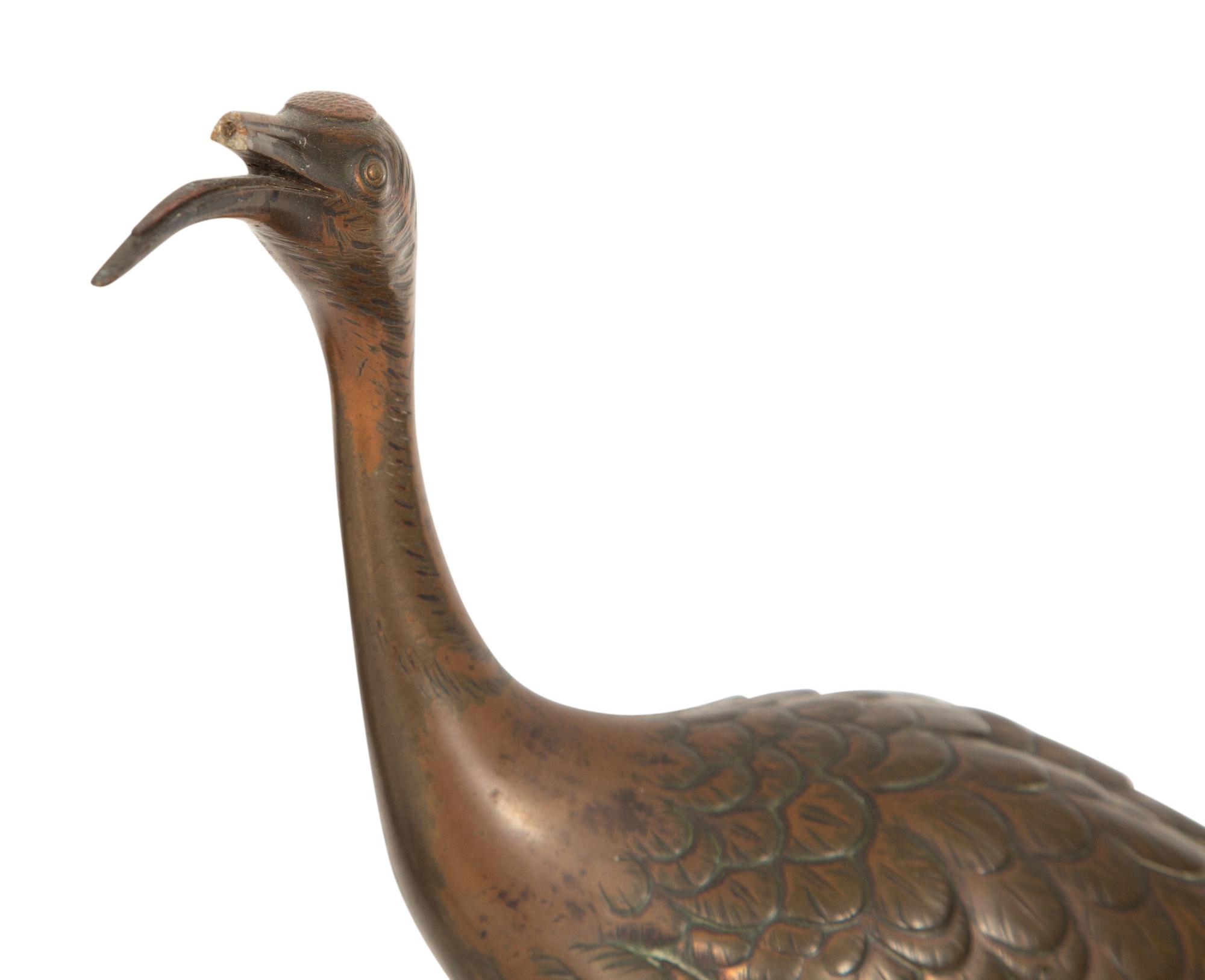 A Pair of Japanese Bronze Figures of Cranes