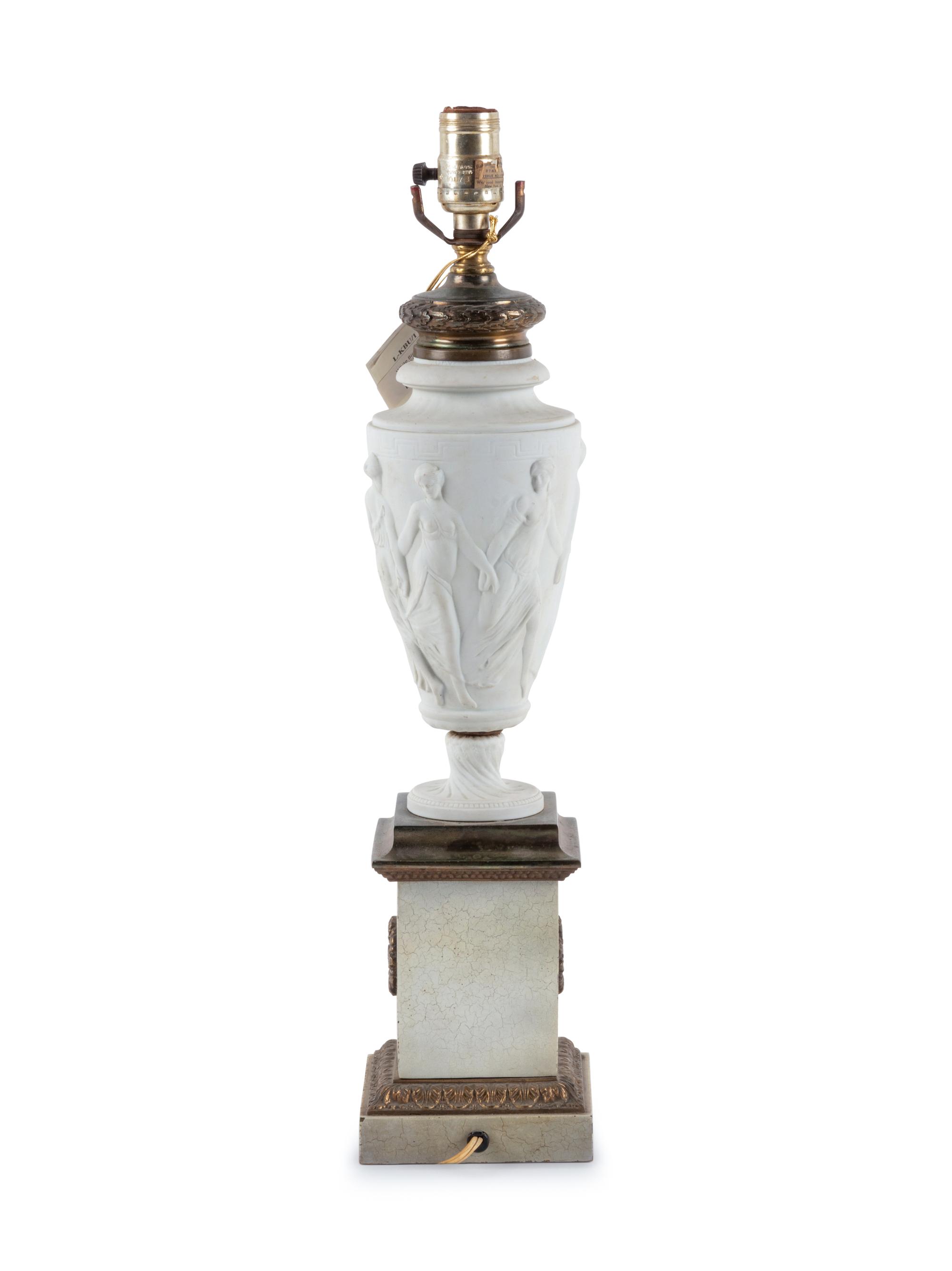 A Neoclassical Bisque Porcelain and Gilt Metal Mounted Table Lamp