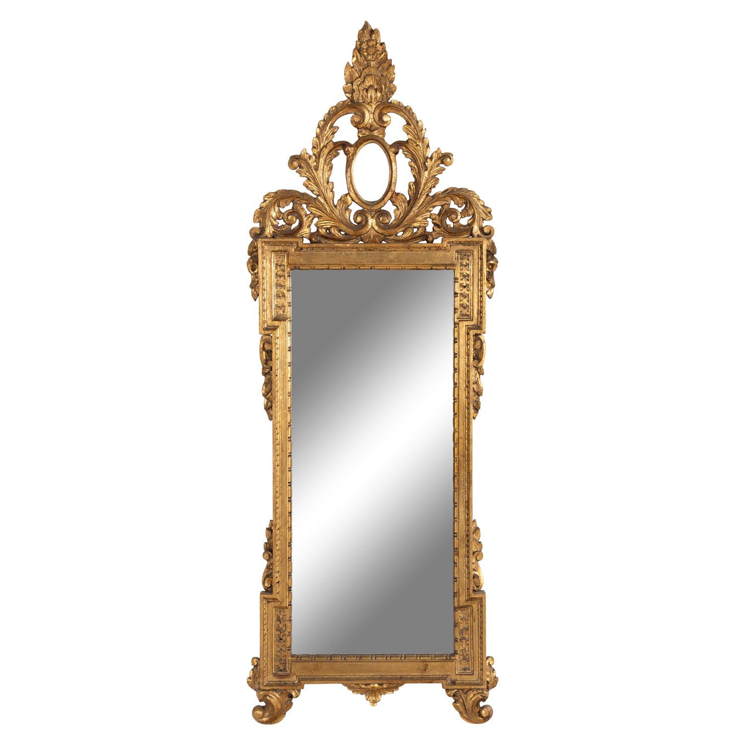 An Italian Baroque Style Giltwood Mirror