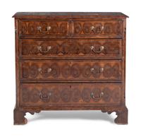 A George III Oysterwood-Veneered Chest of Drawers