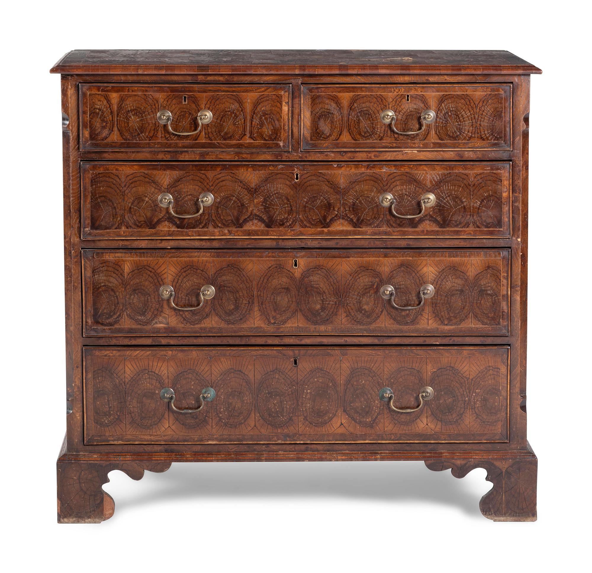 A George III Oysterwood-Veneered Chest of Drawers