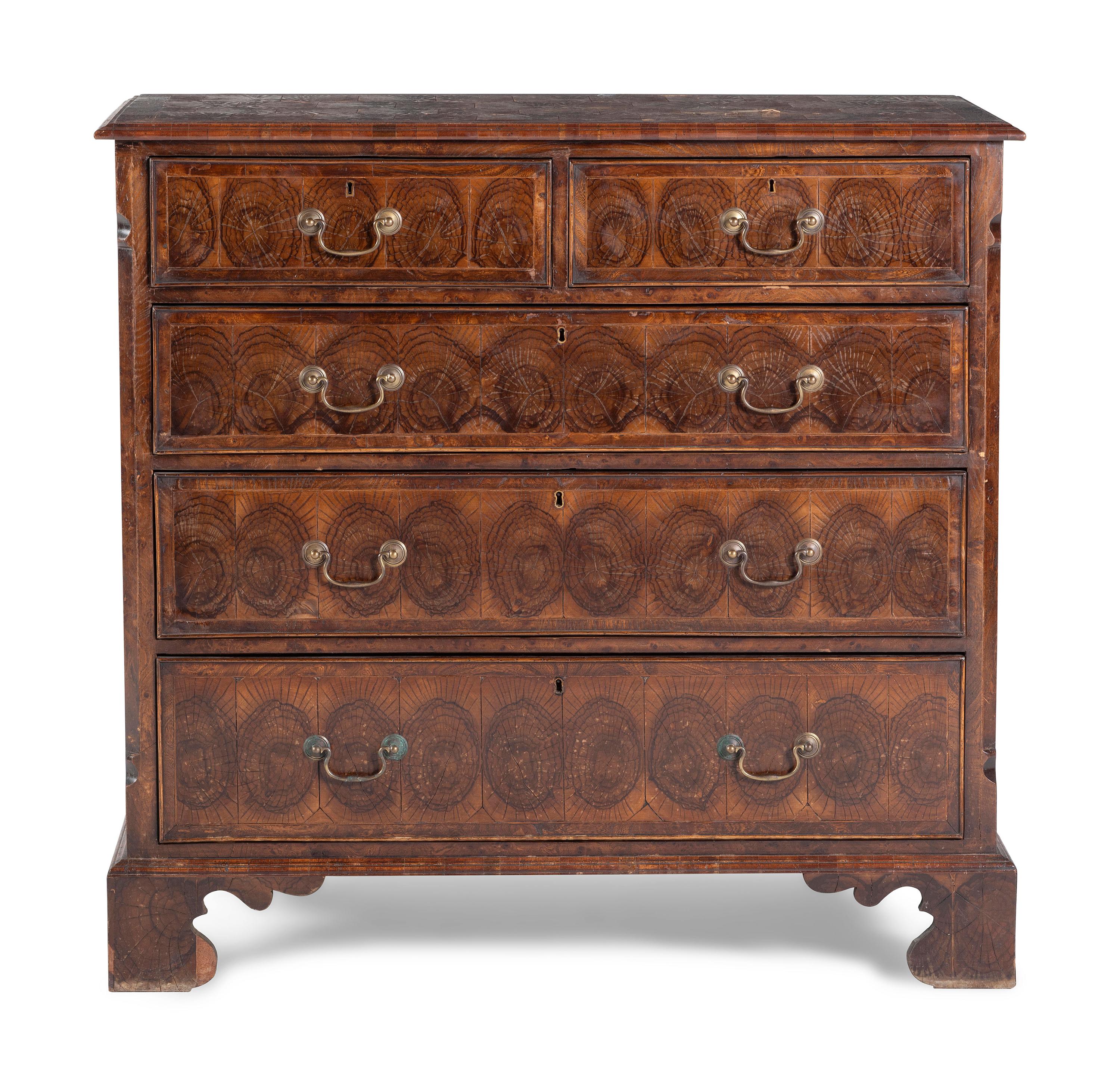 A George III Oysterwood-Veneered Chest of Drawers