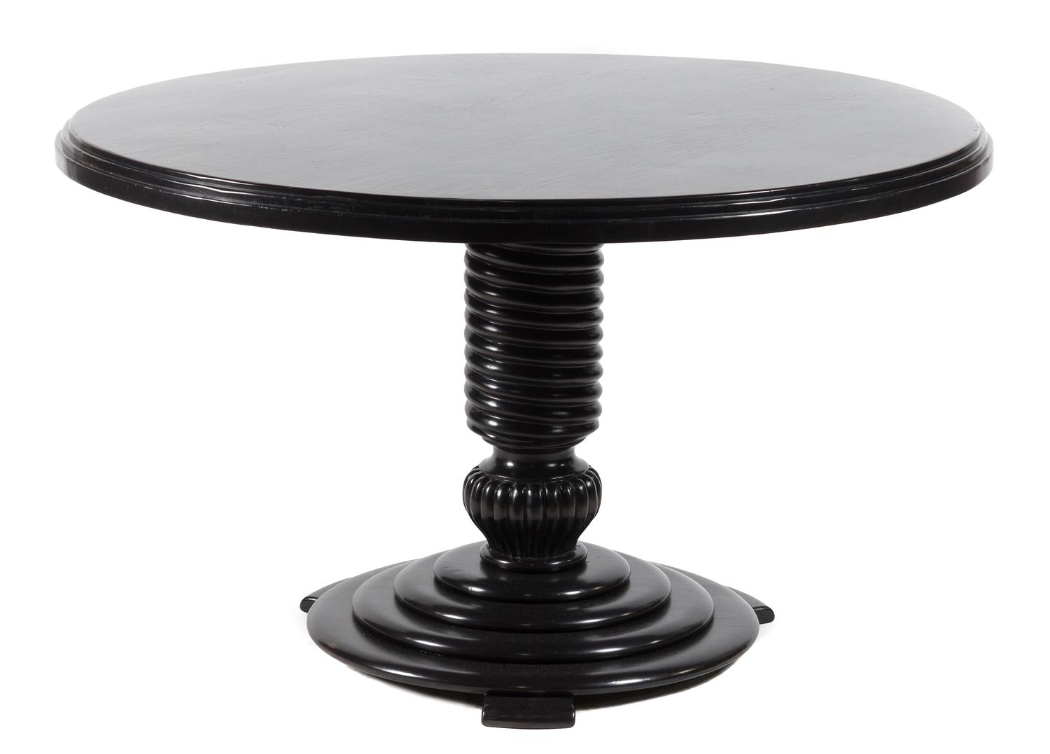 An Ebonized Occasional Table Height 28 1/2 x diameter 47 inches.