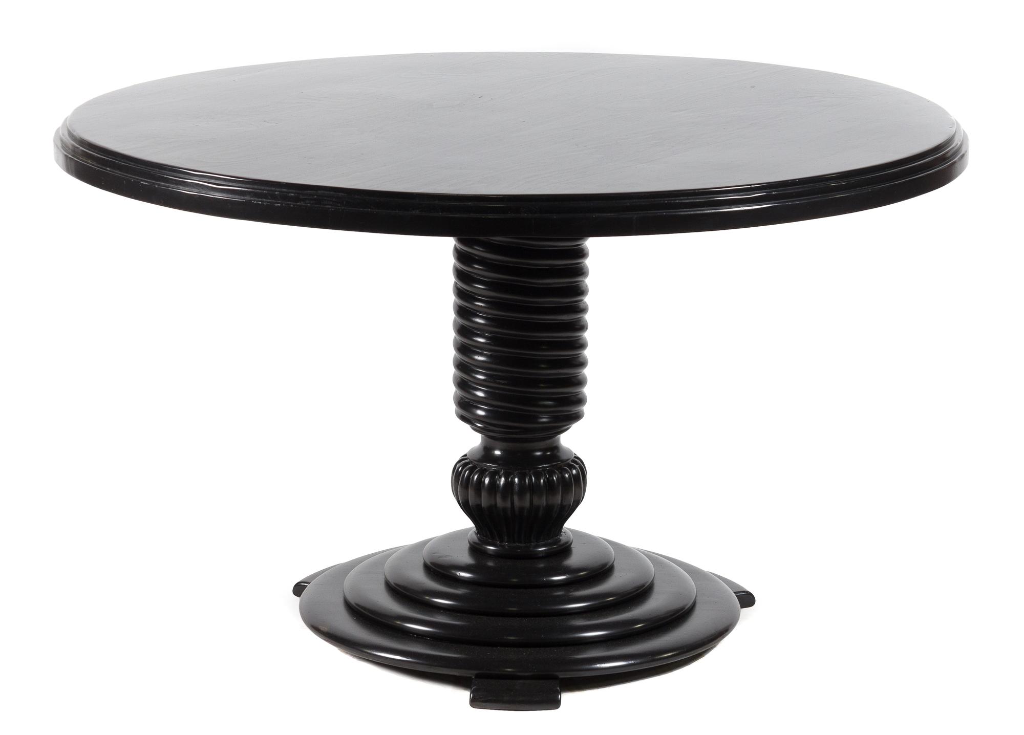 An Ebonized Occasional Table Height 28 1/2 x diameter 47 inches.