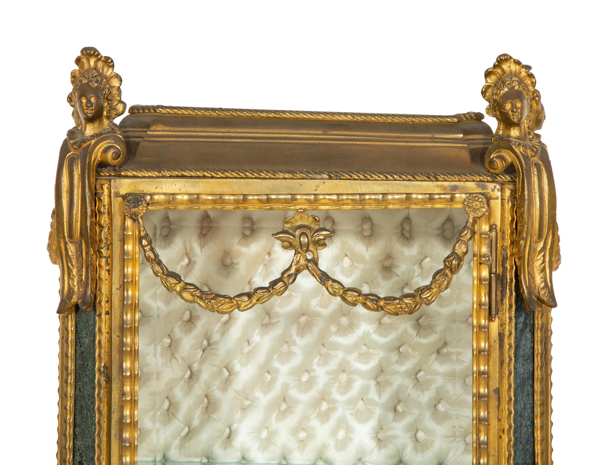 A Pair of Napoleon III Gilt Bronze Vitrines
