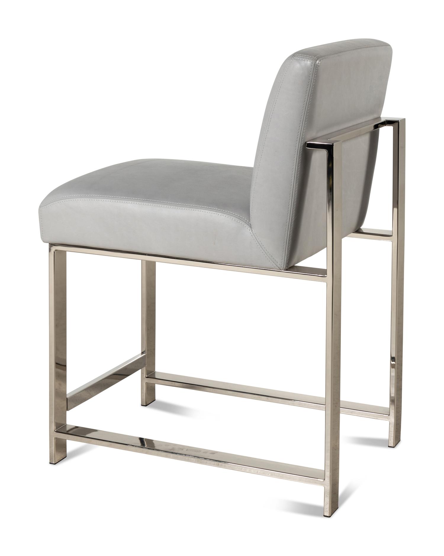 A Set of Four Contemporary Leather-Upholstered Chairs