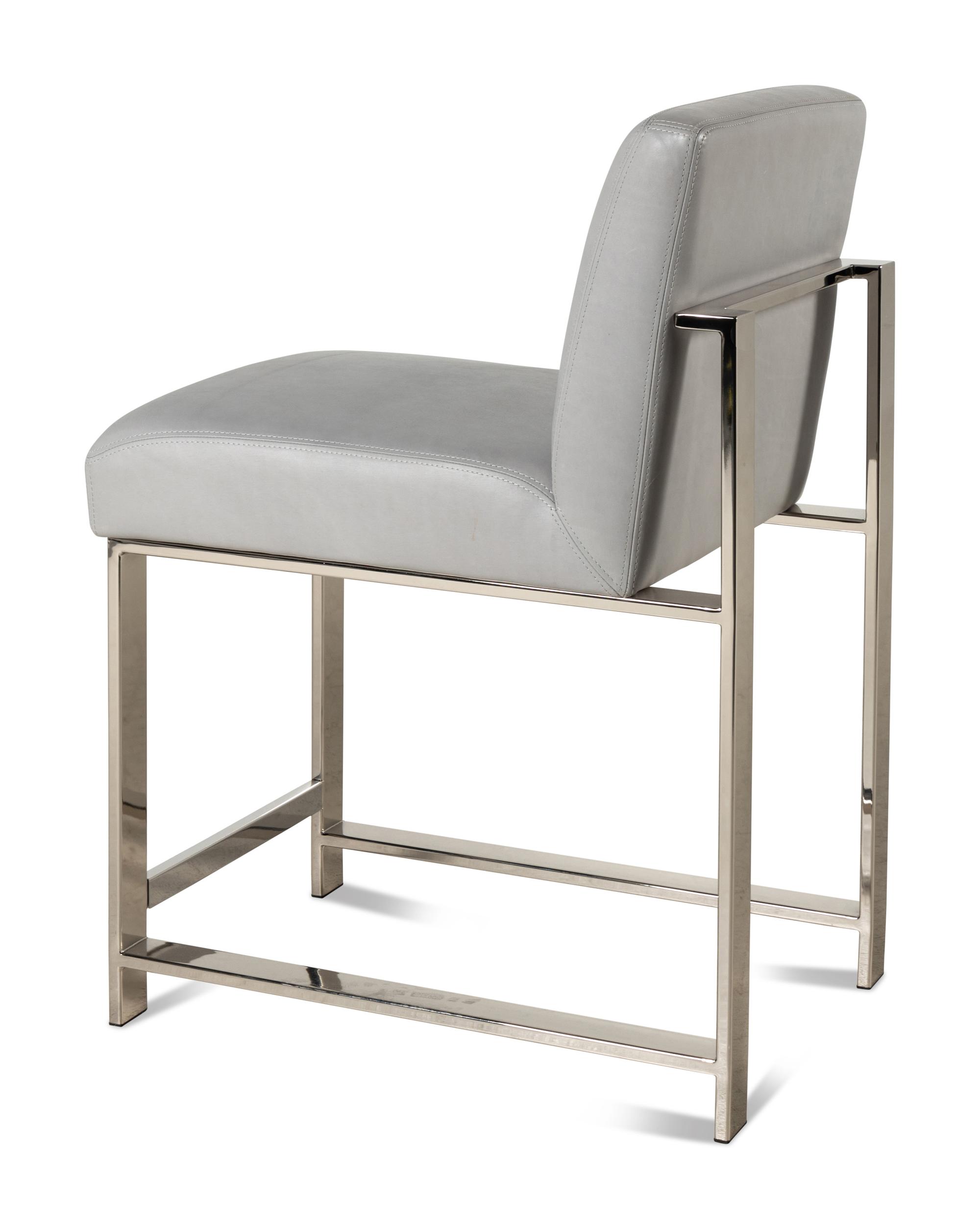 A Set of Four Contemporary Leather-Upholstered Chairs