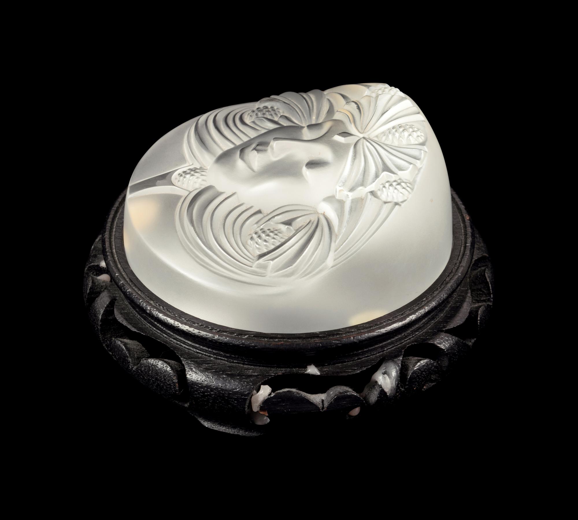 A Lalique Psyche Paperweight