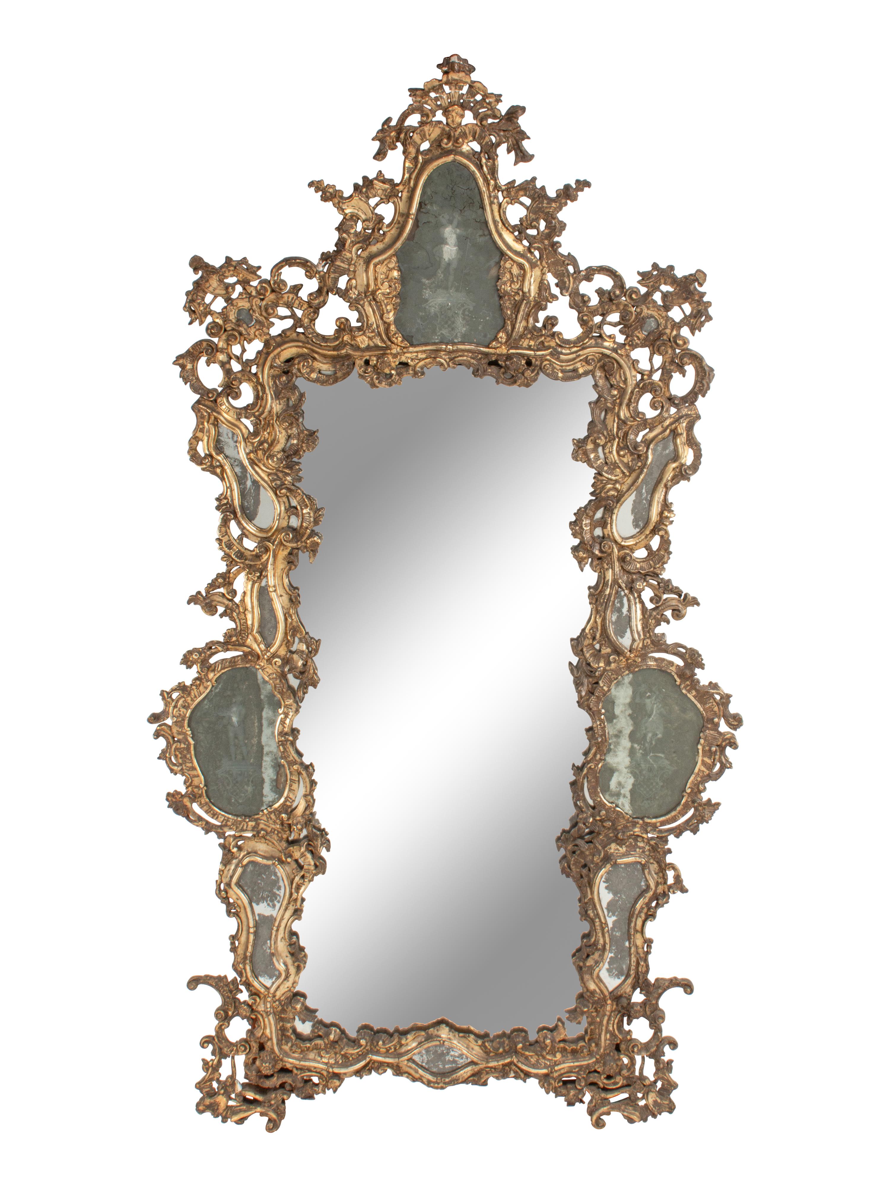 An Italian Silvered Wood and Etched Glass Mirror