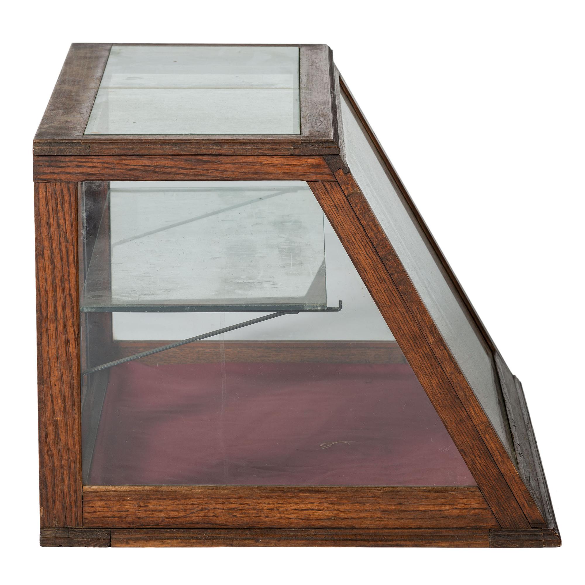 An Oak Frame Slant-Front Countertop Display Case