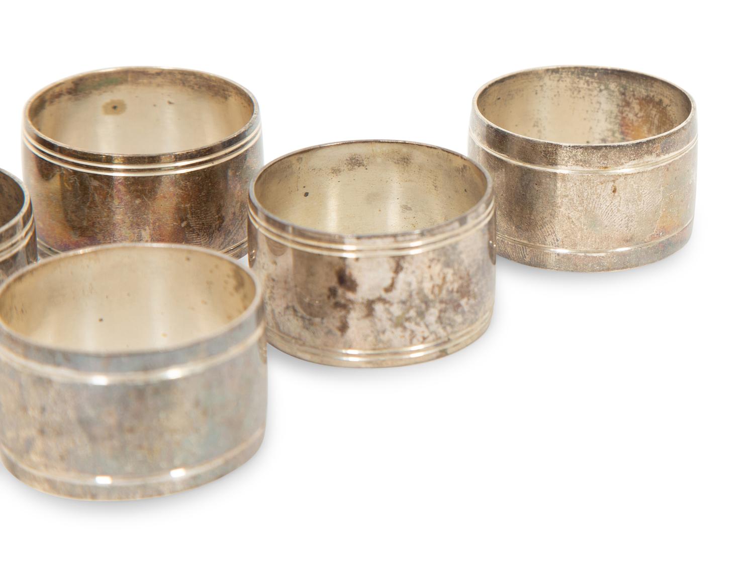 Twenty-two English Silver Napkin Rings by J. A. Campbell, London 1977-2012