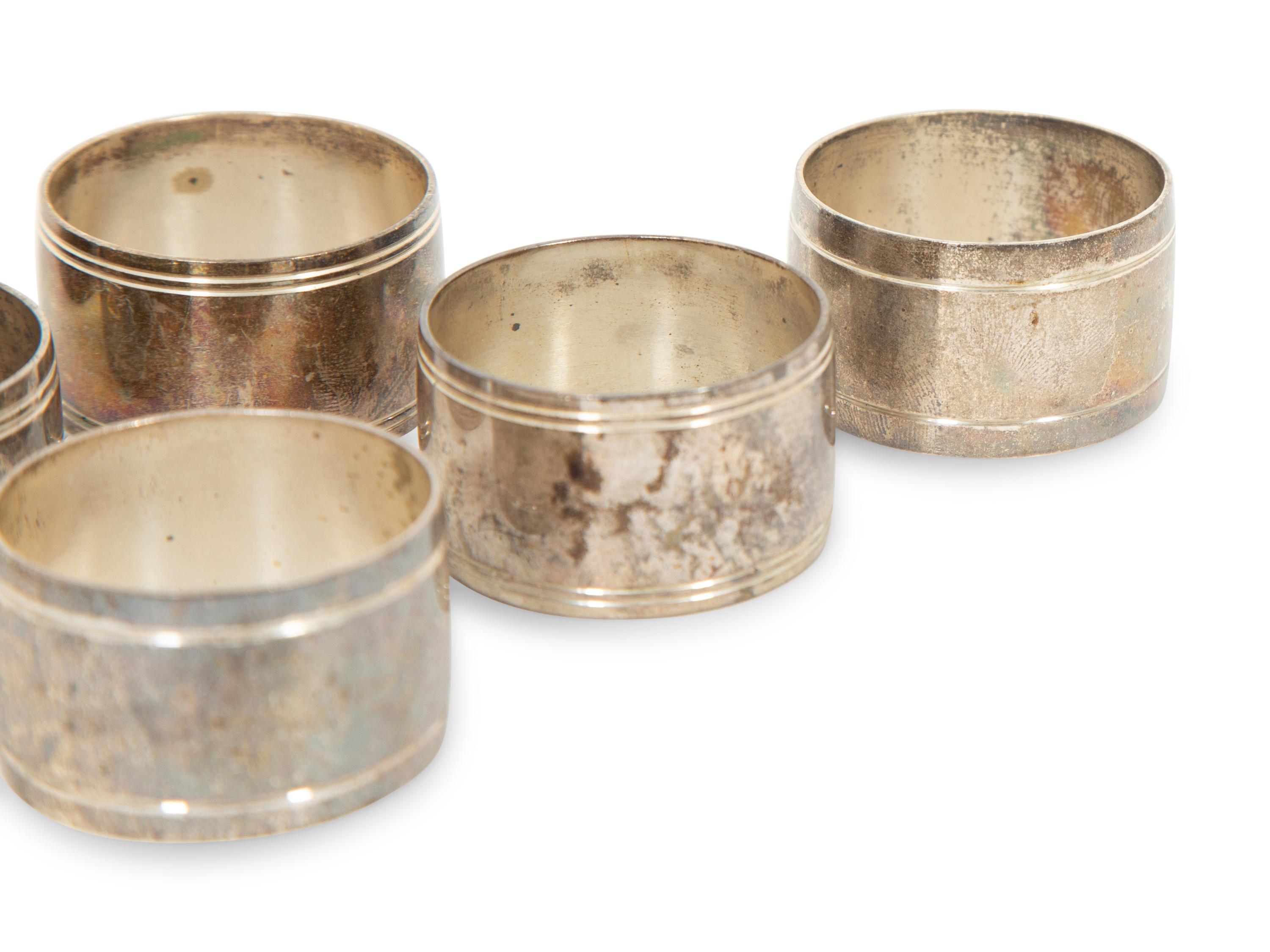 Twenty-two English Silver Napkin Rings by J. A. Campbell, London 1977-2012